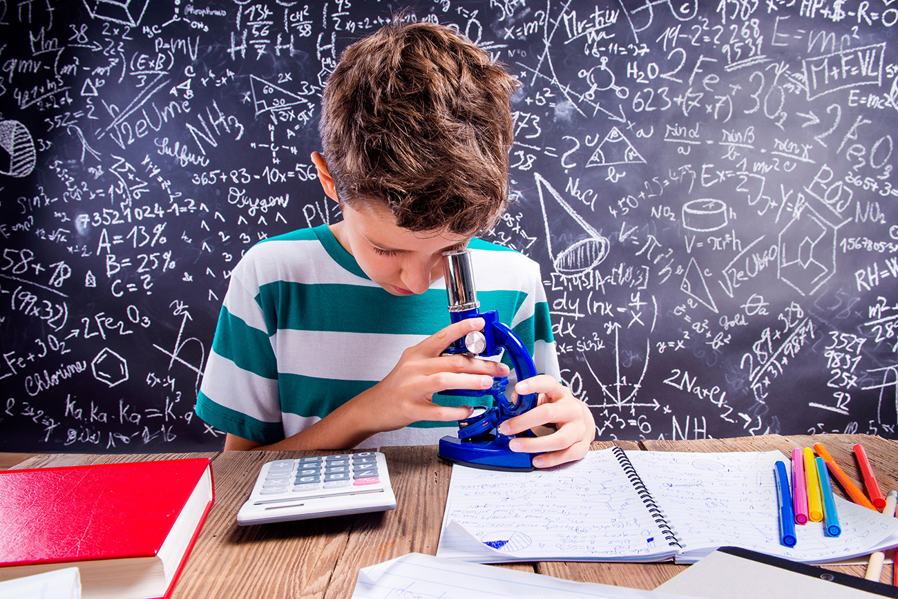 Photo: Kid with microscope